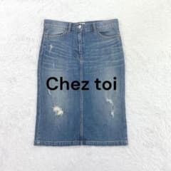 Distressed denim skirt, size M, indigo, ripped, knee-length, stretchy, autumn.