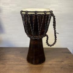 Djembe (a type of drum) - a folk instrument, a percussion instrument.