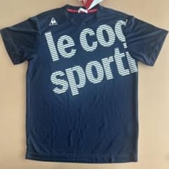 【新品タグ付き】le coq sportif ネイビー Tシャツ メンズMサイズのサムネイル