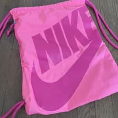 NIKE ナップサック ピンク 巾着型 リュック - メルカリ
