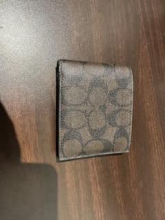 コーチ　二つ折り財布のサムネイル
