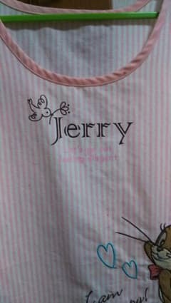 ジェリー エプロン ピンク 保育士 一ヶ所ボールペン染み有 トムとジェリーのサムネイル