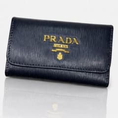 PRADA プラダ ロゴ金具 6連キーケース ゴールド金具 - メルカリ