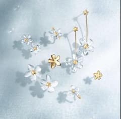 美品☆STAR JEWELRY TRANSPARENT FLOWER ピアス - メルカリ