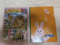 Clear file featuring a rabbit with glasses, tempura ghost, Ghibli, and the Catbus.