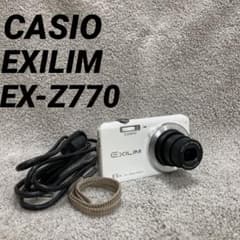 Tested and working: Casio Exilim EX-Z770 white watch with USB charging cable.