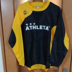 ATHLETA 長袖ピステ 160 黒/黄のサムネイル