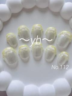 112 ネイルチップ ベリーショート 黄色　白　ガーリー リボン ラメ　フレンチのサムネイル