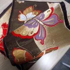 金襴生地 蝶と桜 はぎれ 黒地 帯ハギレ25×94のサムネイル