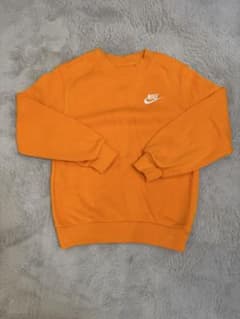 NIKE キッズ トレーナー オレンジのサムネイル