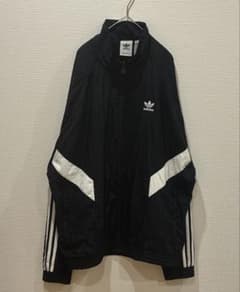 adidas REKIVE ナイロントラックジャケット／大きいサイズ アディダス