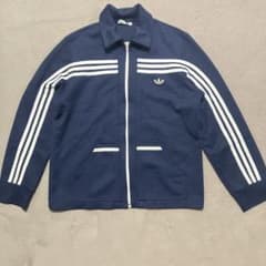 80s adidas track jacket, made in West Germany, size 50, skull design jersey.