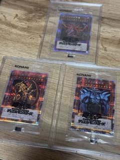 遊戯王OCG 三幻神 未開封パック 3枚セット - メルカリ