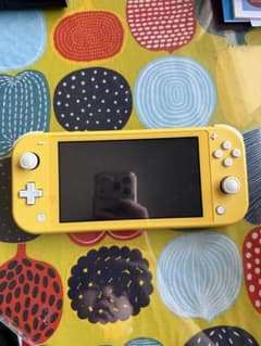 Nintendo Switch Lite イエロー ステッカー付きのサムネイル