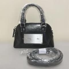MATIN KIM CURVE ZIP MINI BAG IN BLACK - メルカリ