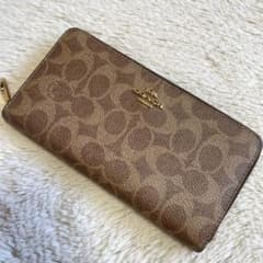 未使用 COACH コーチ 長財布 シグネチャー 馬車金具 ラウンドファスナー