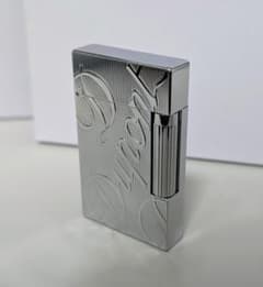 明朗開閉音 エングレーブ ガスライター シルバー - メルカリ