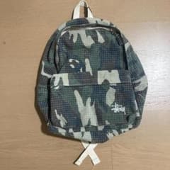 STUSSY NEEDLE PUNCH 迷彩チェックリュック - メルカリ