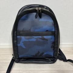 COACH 青・黒迷彩 レザーバックパック - メルカリ