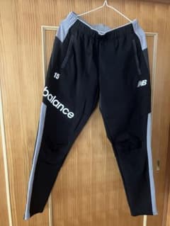 New Balance ニューバランス ジャージパンツ ブラック 15番ロゴ入りのサムネイル