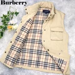 美品✨BURBERRY ダウンベスト ラクーンファー ノバチェック カーキ 38 関税負担なしBurberryチェックナイロンリバーシブルパファージレ