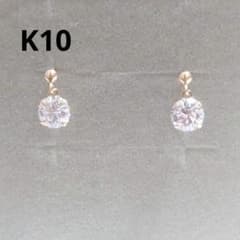 未使用 ツツミ キュービックジルコニア スイング ピアス K10YG - メルカリ