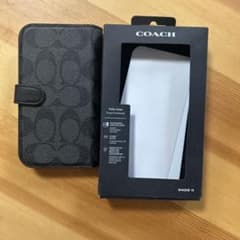 COACH iPhone 15用フォリオケース ブラック - メルカリ