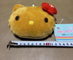 Hello Kitty 猫の顔型ポーチ　日焼けキティーのサムネイル