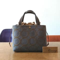 あおりポケットの巾着バッグ＊ミナペルホネン - メルカリ