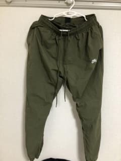 NIKE カーキトラックパンツのサムネイル