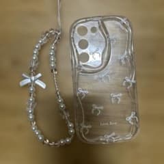 リボン柄 スマホケース パールストラップ付のサムネイル