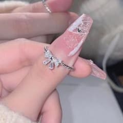 【新品】リボンモチーフ リング シルバーカラー 指輪のサムネイル
