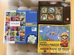 Three puzzle sets: Mario Maker (300 pieces), Pixar (96 pieces), and Ghibli (208 pieces).