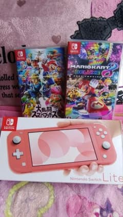 【本日限り値下げ】任天堂Switchライト本体　コーラル　＋　ソフト2本のサムネイル