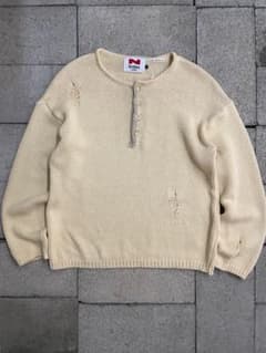 Archiveの薄黄色いヘンリーネックニットのサムネイル