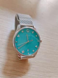 GUCCI 時計　ターコイズブルー　レディースのサムネイル