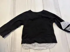 黒の長袖トップス