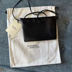 新品NOTHING WRITTEN ブラック ショルダーバッグ タグ付き - メルカリ