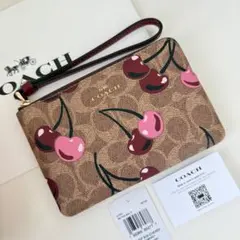 COACH コーチ ポーチ財布　コーナージップリストレット ブラウン　チェリー柄