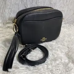 美品　現行　コーチ　ショルダーバッグ　カメラバッグ　タッセル　黒　シボ革