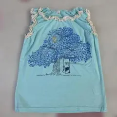 水色 フリル付きタンクトップ 木とブランコ