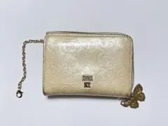 ANNA SUI ゴールド 二つ折り財布 蝶の装飾付き