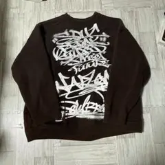 ASIAN CAN CONTROLERZのブラックのスウェットシャツ