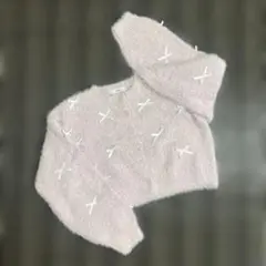 リボン装飾の薄いピンクニットカーディガン