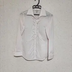 フリル付きピンク長袖シャツ