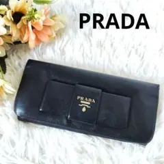 PRADAプラダ　長財布 二つ折り リボン サフィアーノレザー メタルロゴ　黒
