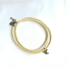 レザーブレスレット2本セット編み込み×鳩チャーム＆メタルアクセント付き