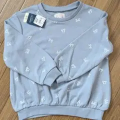 新品　リボン柄 ライトブルー裏毛トレーナー　110 西松屋