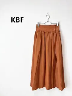 【美シルエット】KBF フレアロングスカート サイドボタンオレンジ ウエストゴム