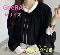 新品タグ付GeeRA前後2WAYバイカラーブラウスMサイズ黒系のサムネイル